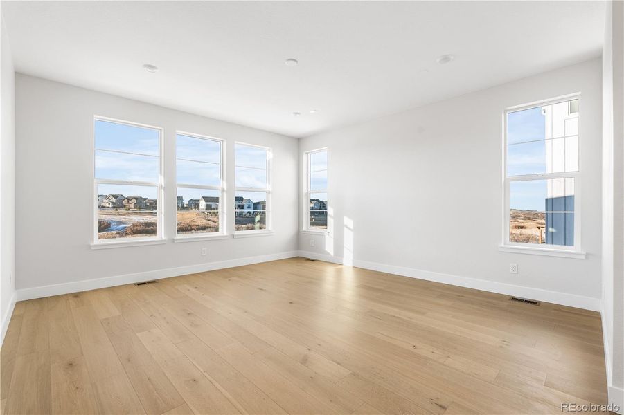 Spacious, unfurnished interior of a new home in Luxe at The Canyons, Castle Pines (Image 46).