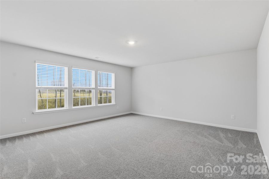 Spacious, unfurnished interior of a new home in Redhawk: Enclave, Belmont (Image 22).