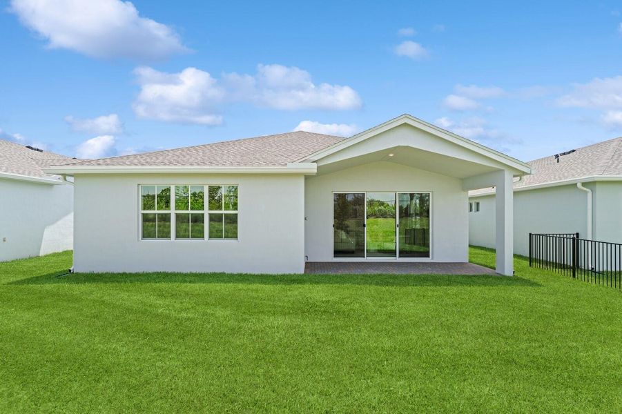 Front exterior of a new home in , Port St. Lucie, FL, highlighting curb appeal (Image 2).