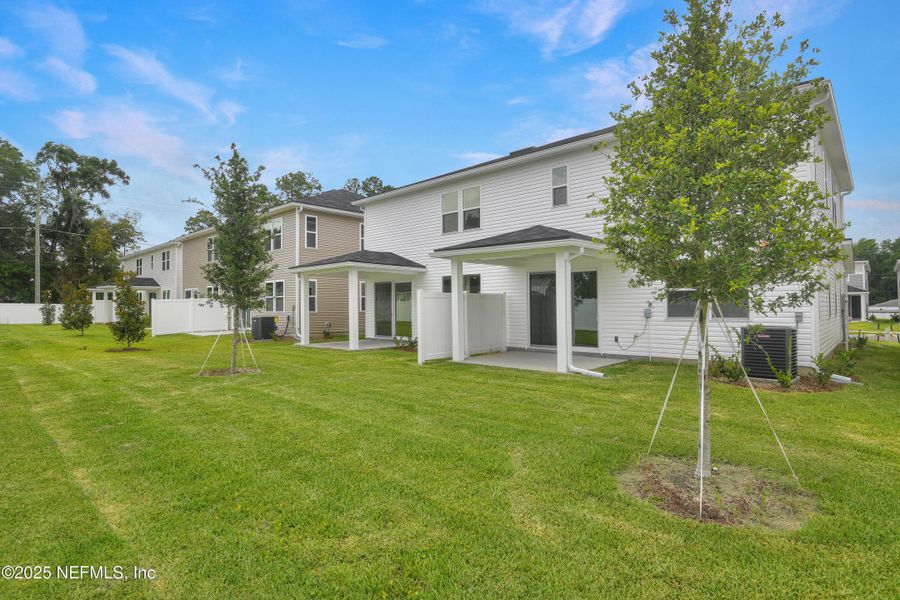 Front exterior of a new home in , Jacksonville, FL, highlighting curb appeal (Image 16).