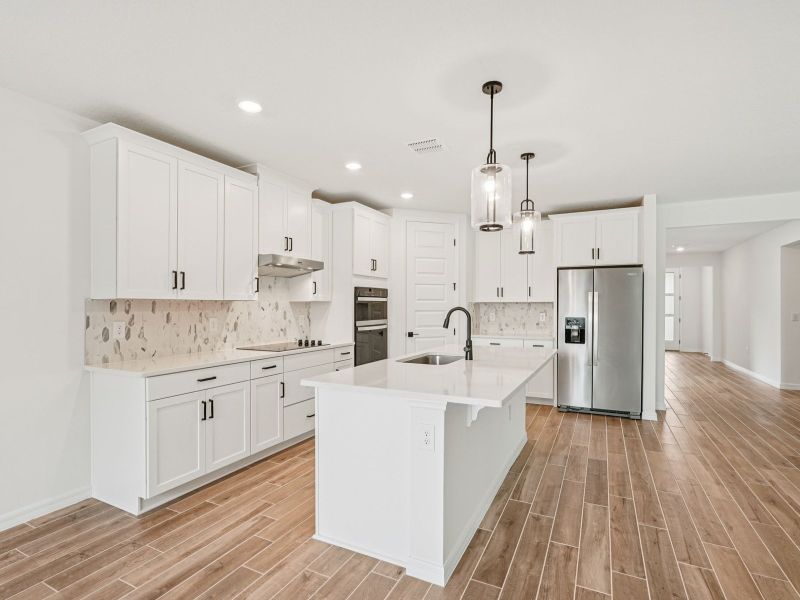 Furnished interior view inside a new home in Oakfield Trails - Signature Series, Parrish (Image 3).