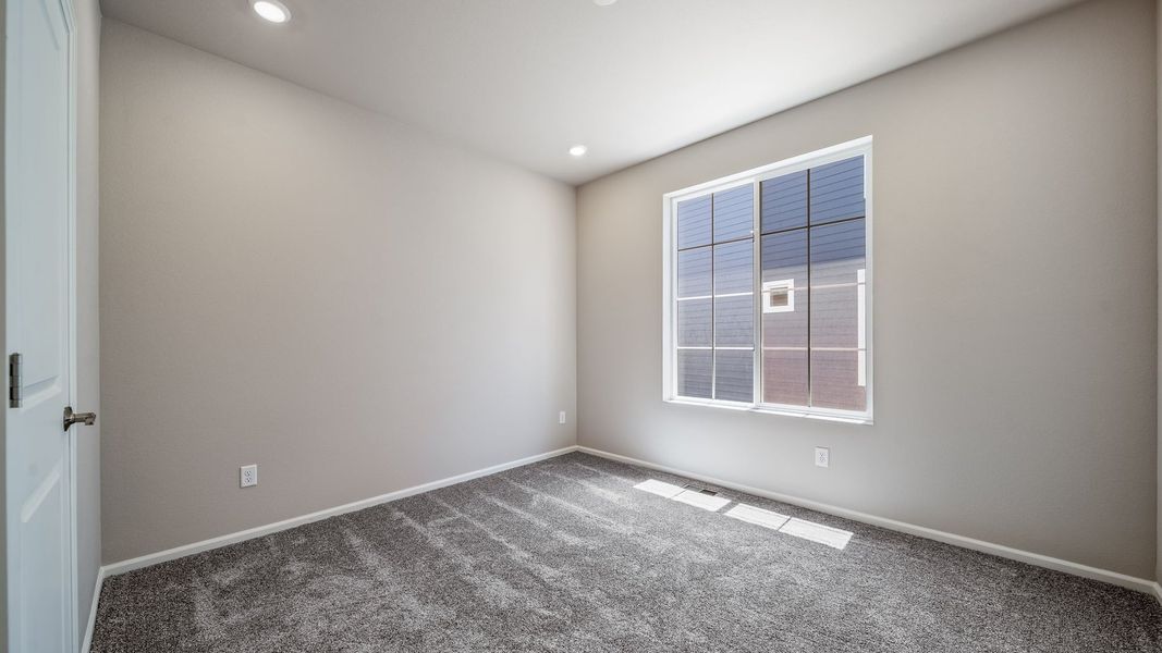 Spacious, unfurnished interior of a new home in The Reserve at Green Valley Ranch, Aurora (Image 21).