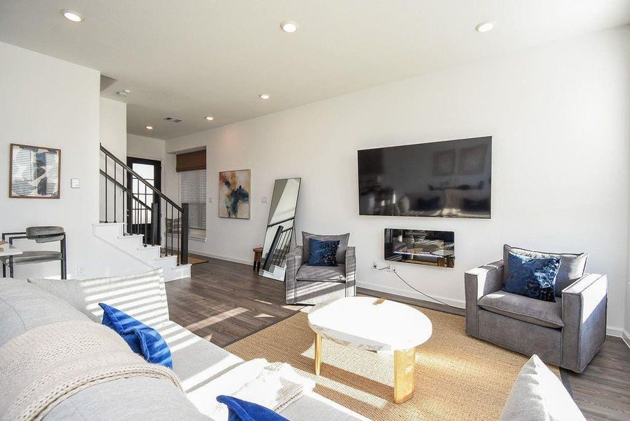 Comfort meets style in this chic living room accented with soft tones and a luxurious atmosphere.