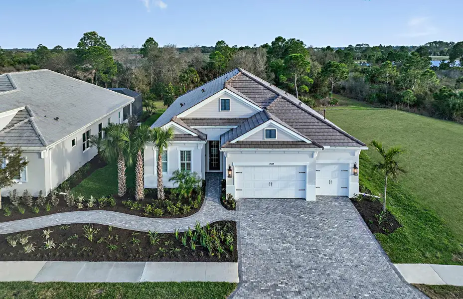 Representative exterior photo of a completed home built from the Silver Sky 2 by Neal Communities in Avelina, Venice, FL (Image 2). Representative exterior photo of a completed home built from the Silver Sky 2 by Neal Communities in Avelina, Venice, FL (Image 2).
