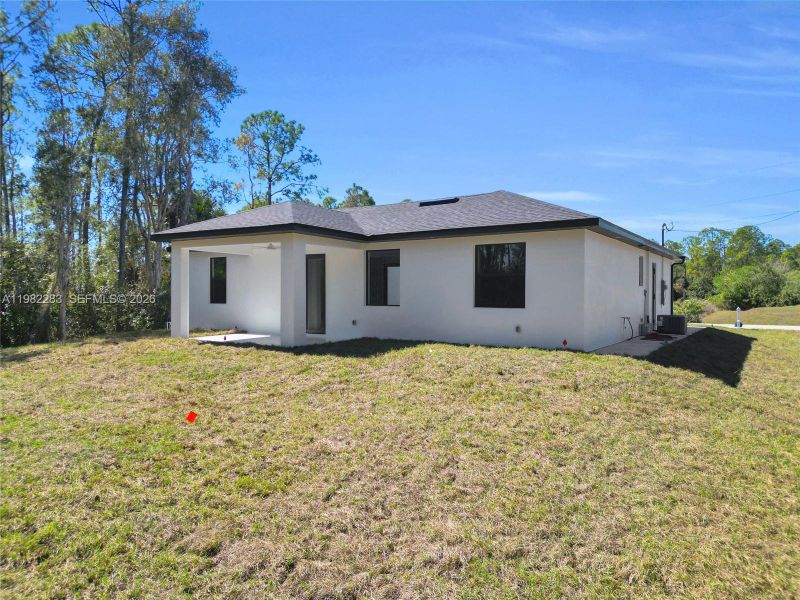 Exterior details and patio area of a home in , Lehigh Acres (Image 3).