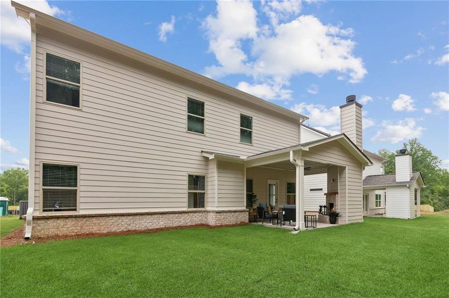 Exterior details and patio area of a home in , Flowery Branch (Image 28).
