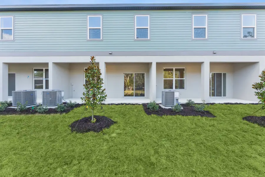 Exterior details and patio area of a home in Connors Cove, Eustis (Image 4).
