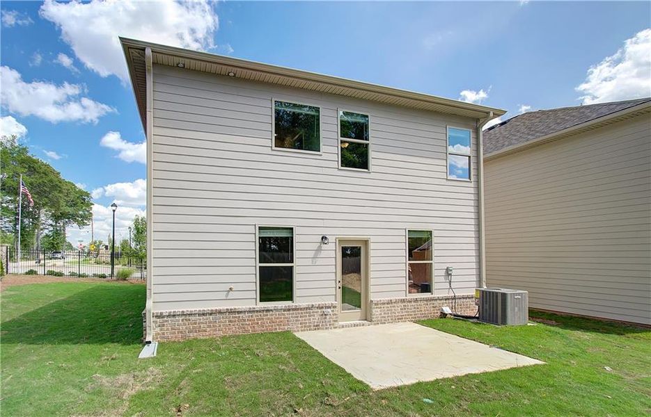 Exterior details and patio area of a home in Towne Center, Hampton (Image 3).