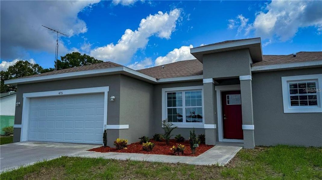 Front exterior of a new home in , Ocala, FL, highlighting curb appeal (Image 22).