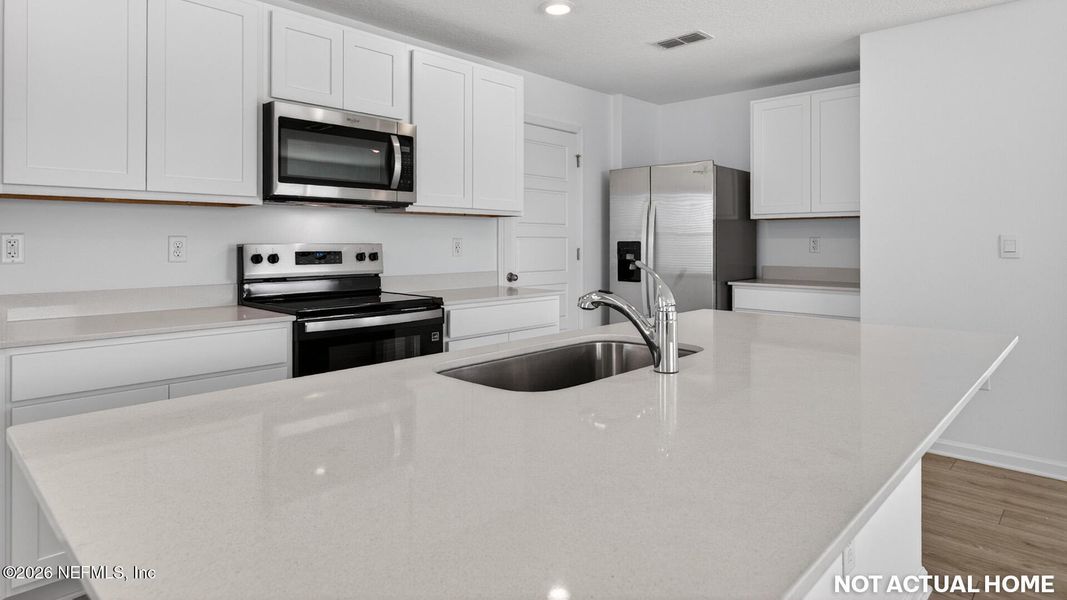 Furnished interior view inside a new home in Rookery, Green Cove Springs (Image 9).