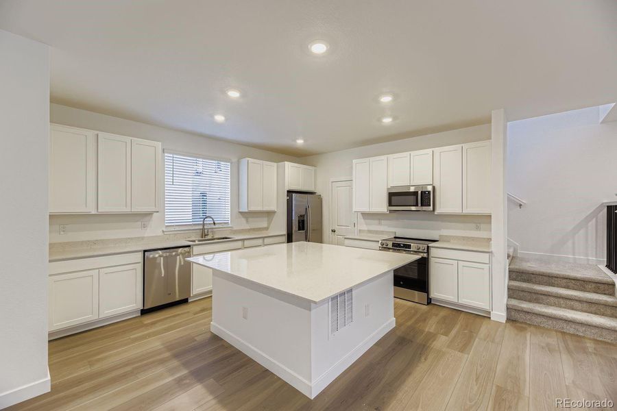 Furnished interior view inside a new home in Vermilion Creek: The Skyline Collection, Centennial (Image 4).