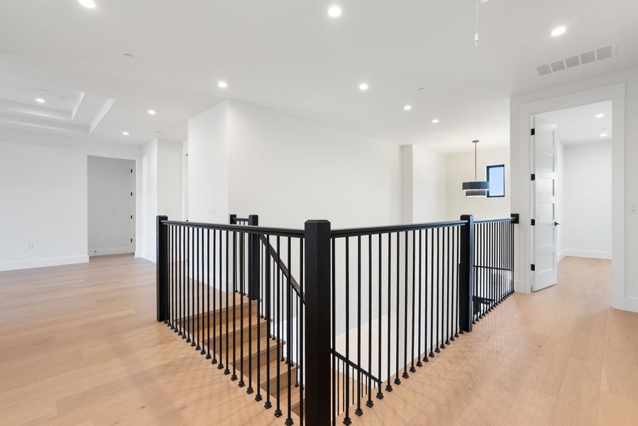 Spacious, unfurnished interior of a new home in Milky Way at River Place, Austin (Image 28).