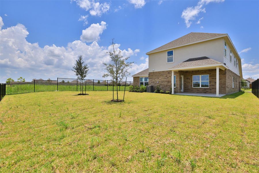 Exterior details and patio area of a home in River Ranch, Dayton (Image 22). Exterior details and patio area of a home in River Ranch, Dayton (Image 22).