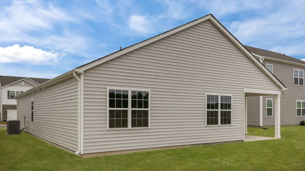 Exterior details and patio area of a home in Ridgewood Farms, Winterville (Image 21).