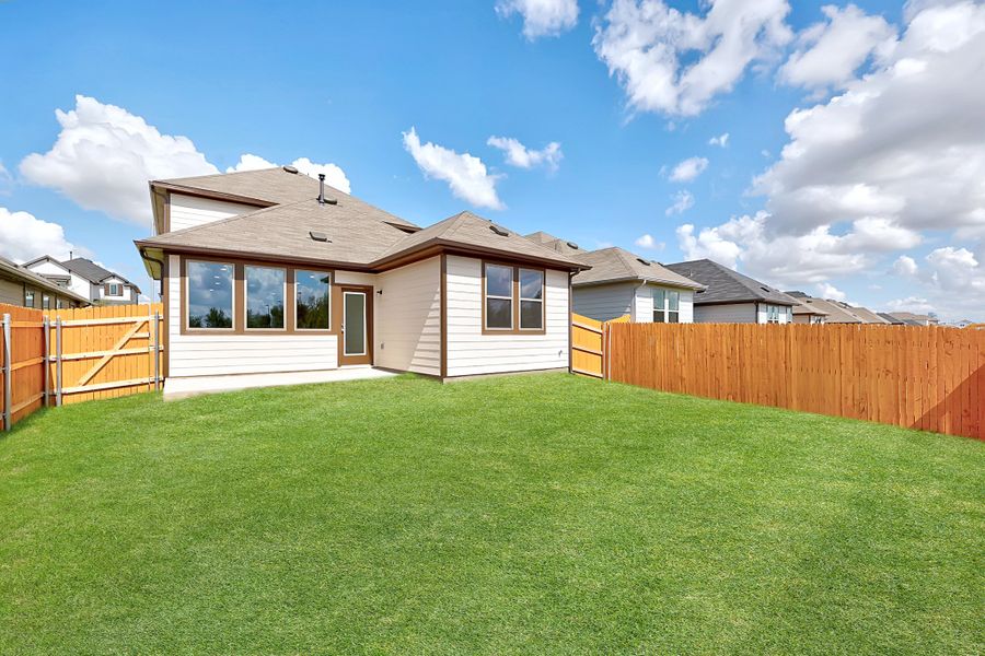 Exterior details and patio area of a home in Trinity Ranch, Elgin (Image 22).
