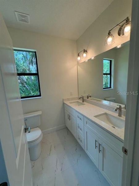 Furnished interior view inside a new home in , Port Charlotte (Image 6).