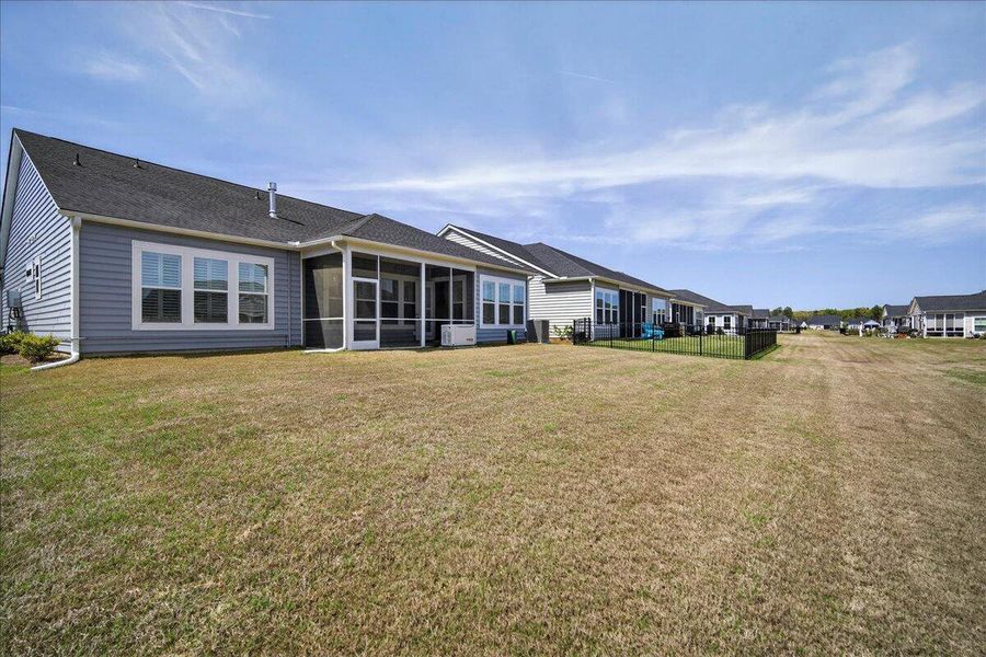 Exterior details and patio area of a home in Horizons at Summers Corner | 55+, Summerville (Image 22).