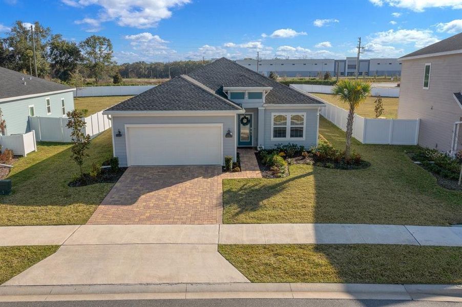 Front exterior of a new home in , Ocala, FL, highlighting curb appeal (Image 24).