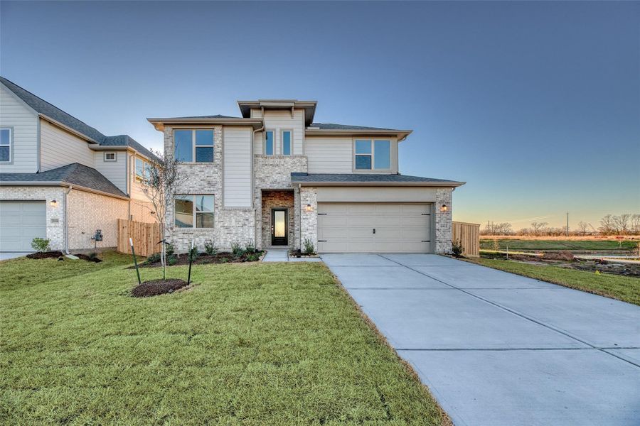 Front exterior of a new home in , Bonney, TX, highlighting curb appeal (Image 22).