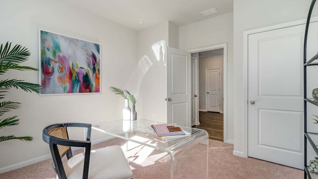Representative furnished interior of a home built from the CALI by D.R. Horton in Sandridge Park, Little River (Image 8).
