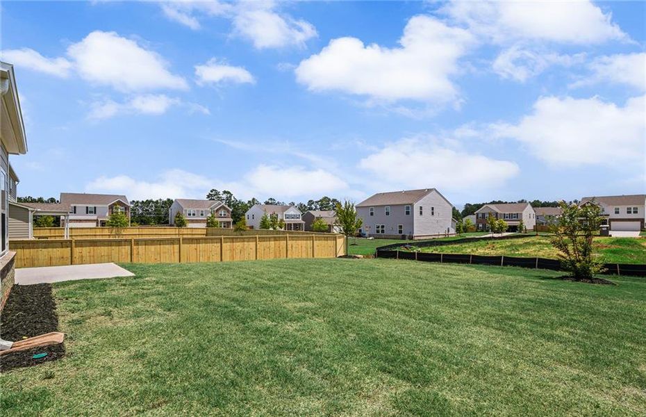 Exterior details and patio area of a home in Anderson Point, McDonough (Image 20).