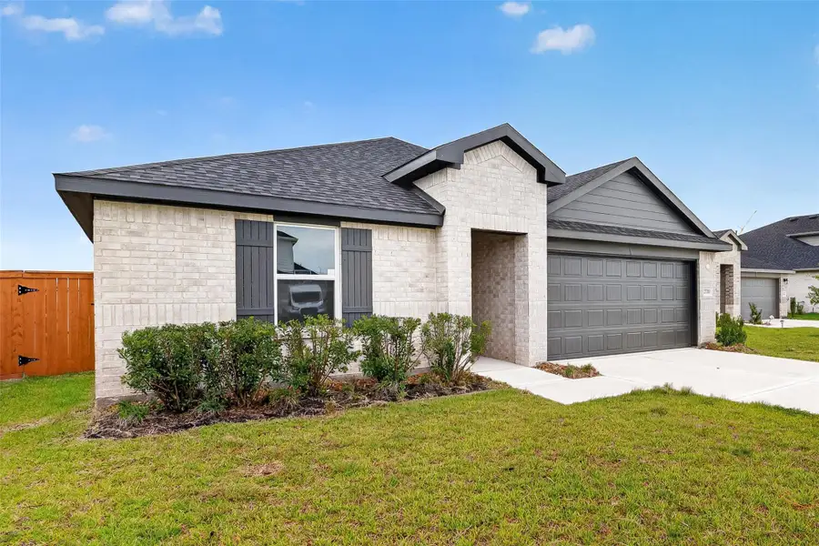 Front exterior of a new home in , Katy, TX, highlighting curb appeal (Image 2). Front exterior of a new home in , Katy, TX, highlighting curb appeal (Image 2).