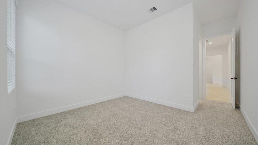 Representative unfurnished interior of a home built from the H70d by D.R. Horton in Butlers Bend Estates, Pinehurst (Image 39).