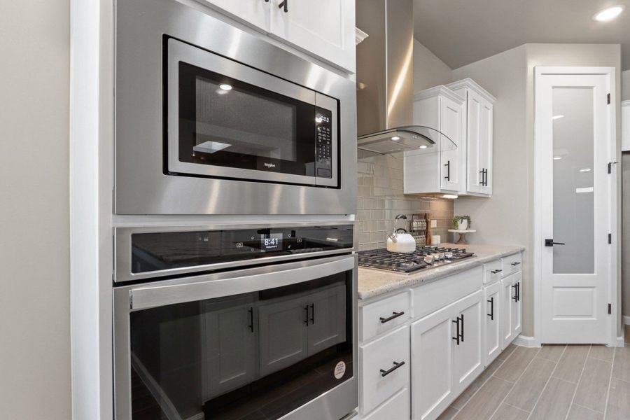 Representative furnished interior of a home built from the Pershing by Hakes Brothers in Paseo Del Este, El Paso (Image 15).