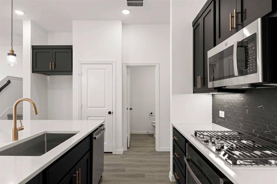 Furnished interior view inside a new home in Collin Creek, Plano (Image 5).