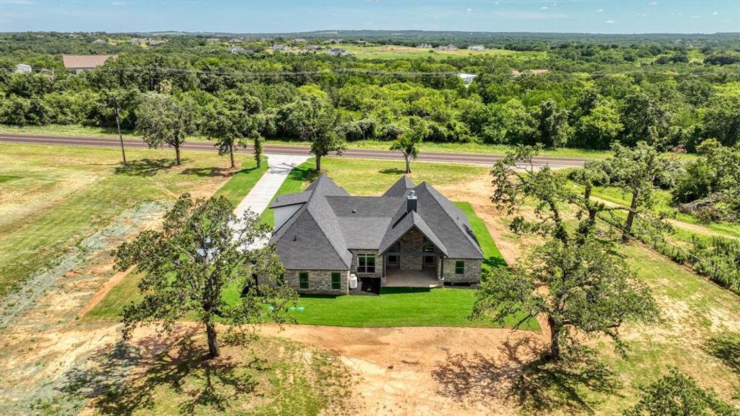 Front exterior of a new home in , Weatherford, TX, highlighting curb appeal (Image 23). Front exterior of a new home in , Weatherford, TX, highlighting curb appeal (Image 23).