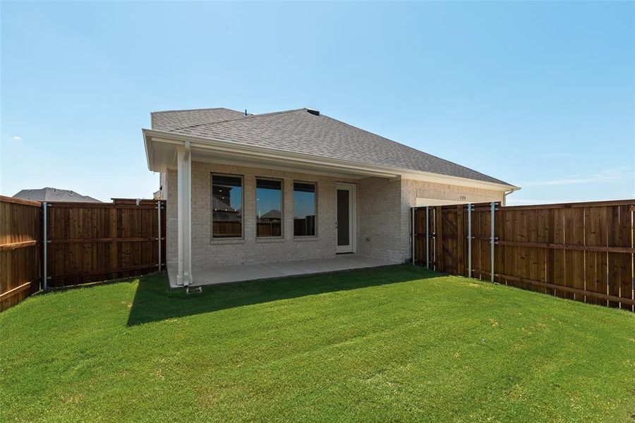 Front exterior of a new home in Villages of Creekwood, Frisco, TX, highlighting curb appeal (Image 18). Front exterior of a new home in Villages of Creekwood, Frisco, TX, highlighting curb appeal (Image 18).