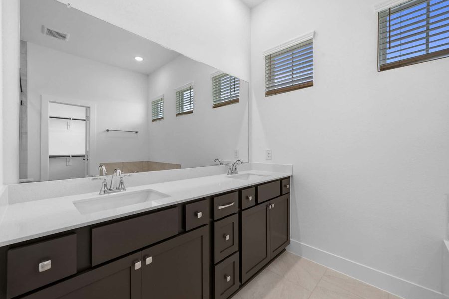 Furnished interior view inside a new home in Bridgeland, Cypress (Image 6).