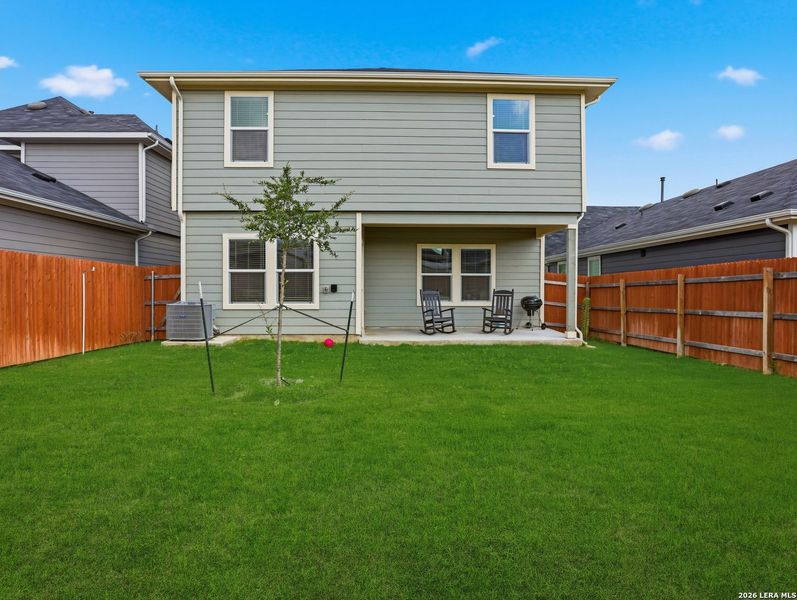 Exterior details and patio area of a home in Watermill, Uhland (Image 25).