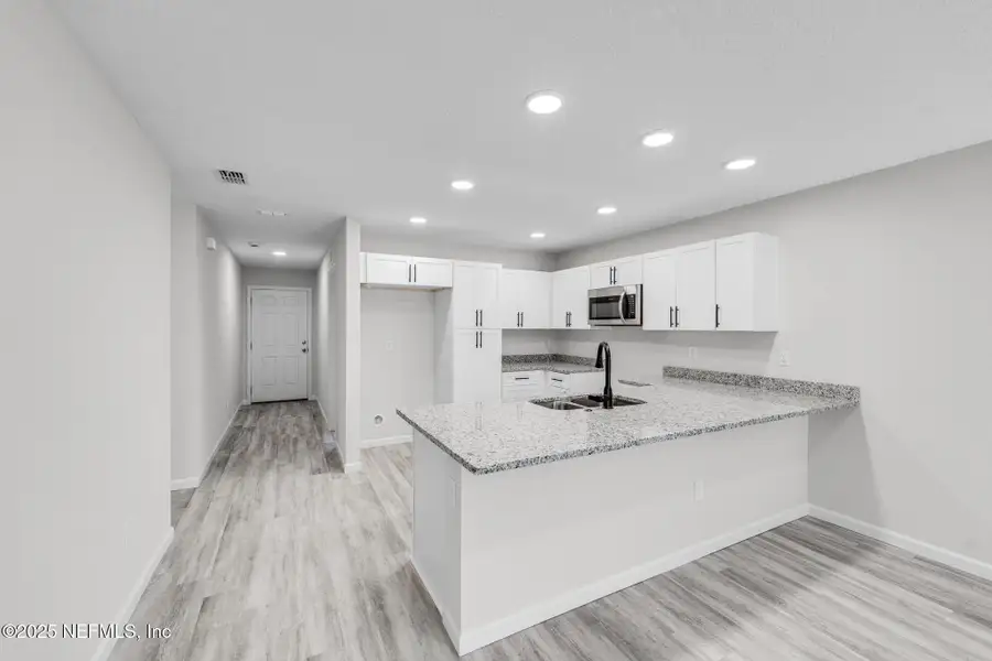 Furnished interior view inside a new home in , Jacksonville (Image 6). Furnished interior view inside a new home in , Jacksonville (Image 6).