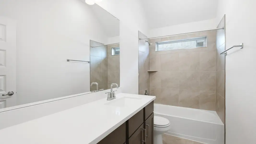 Furnished interior view inside a new home in Sunfield, Buda (Image 17).