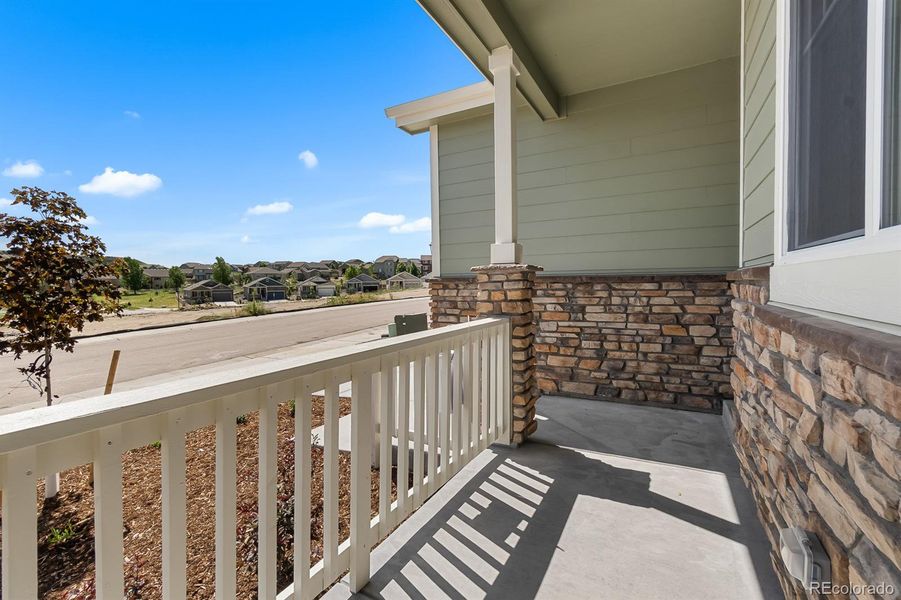 Front exterior of a new home in Rhyolite Ranch, Castle Rock, CO, highlighting curb appeal (Image 24).