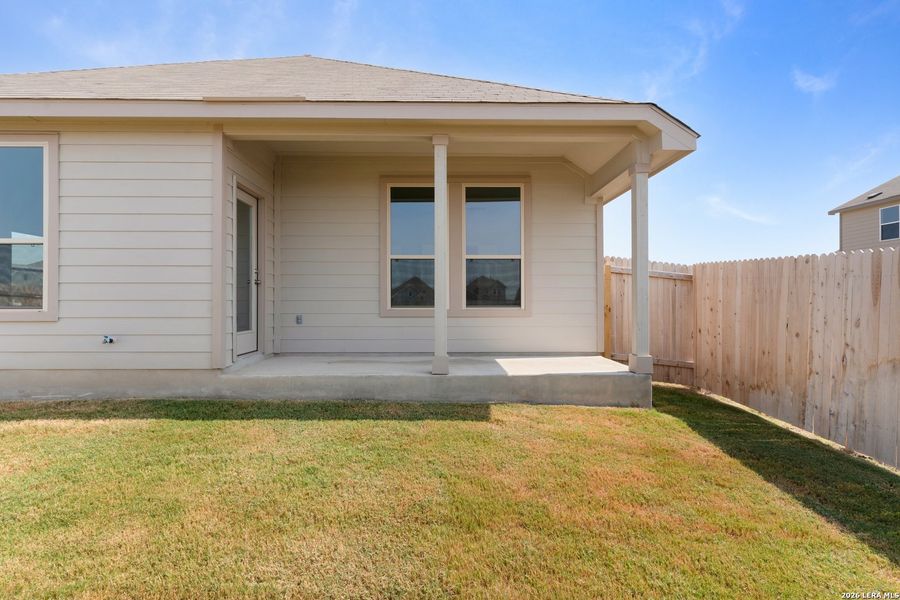 Exterior details and patio area of a home in Prairie Green, Converse (Image 3).