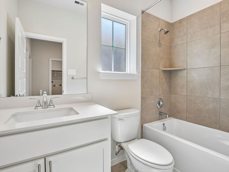 Furnished interior view inside a new home in Pinewood Trails - City Series, Atascocita (Image 9).
