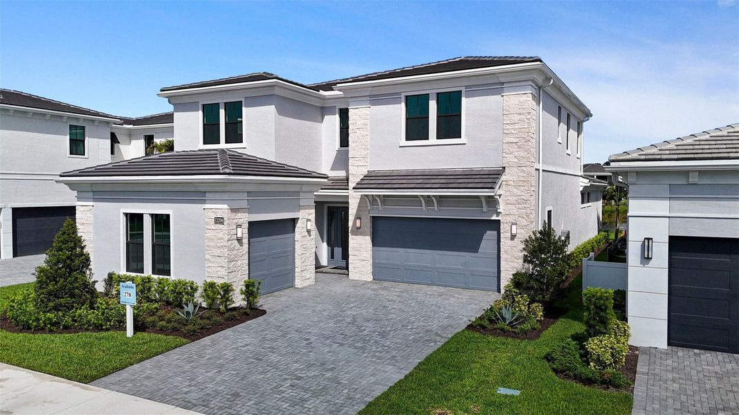 Front exterior of a new home in , Palm Beach Gardens, FL, highlighting curb appeal (Image 25).