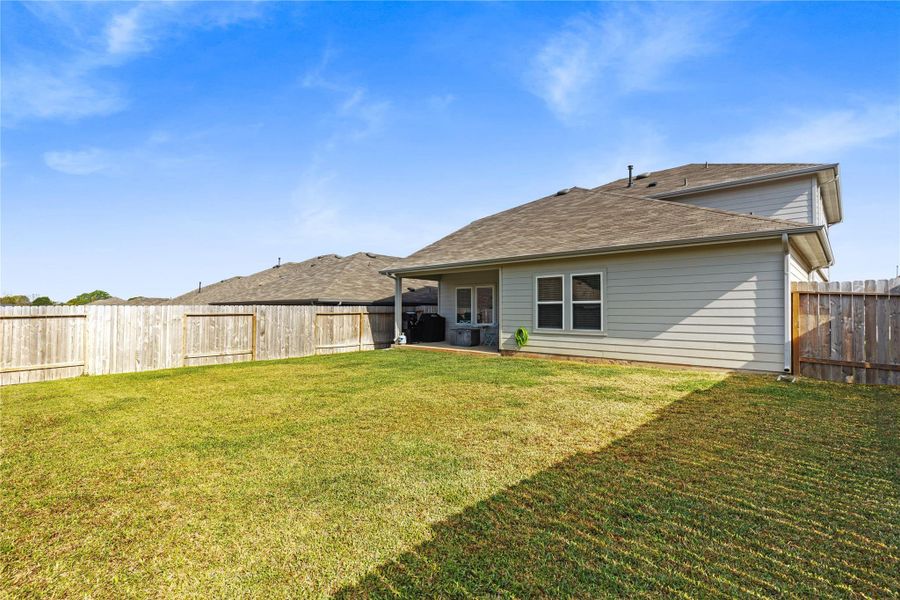 Exterior details and patio area of a home in , Willis (Image 20).