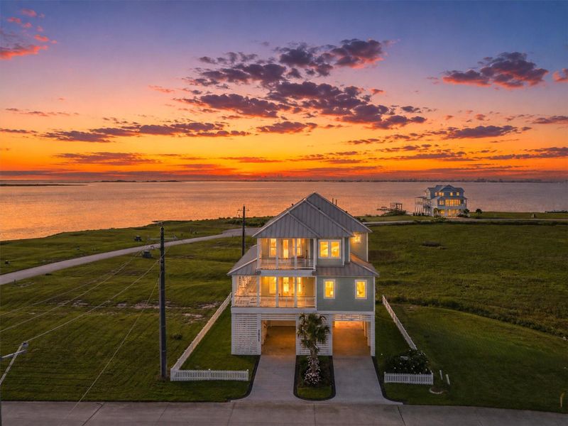 Front exterior of a new home in , Galveston, TX, highlighting curb appeal (Image 27).