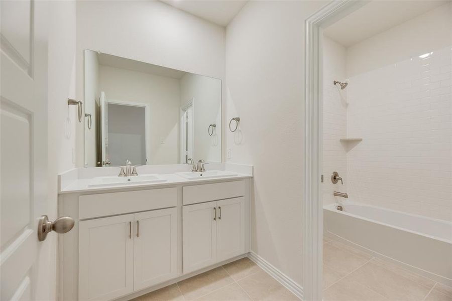 Furnished interior view inside a new home in Villages of Hurricane Creek, Anna (Image 10).