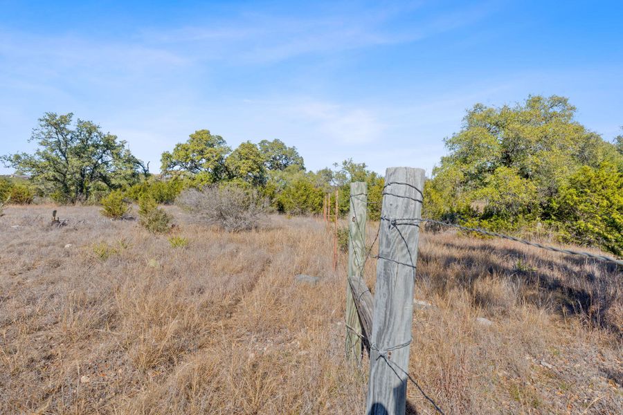 The 17.73 acres is partially fenced with a variety of fence types - some of these may have split the areas for livestock with a previous owner