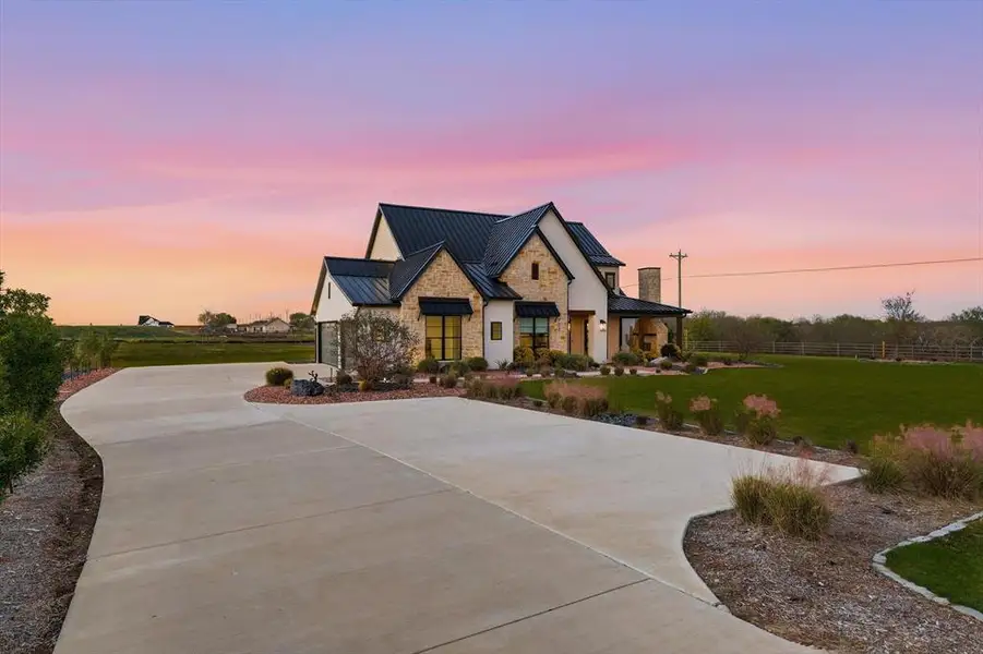 Front exterior of a new home in , Maypearl, TX, highlighting curb appeal (Image 1). Front exterior of a new home in , Maypearl, TX, highlighting curb appeal (Image 1).