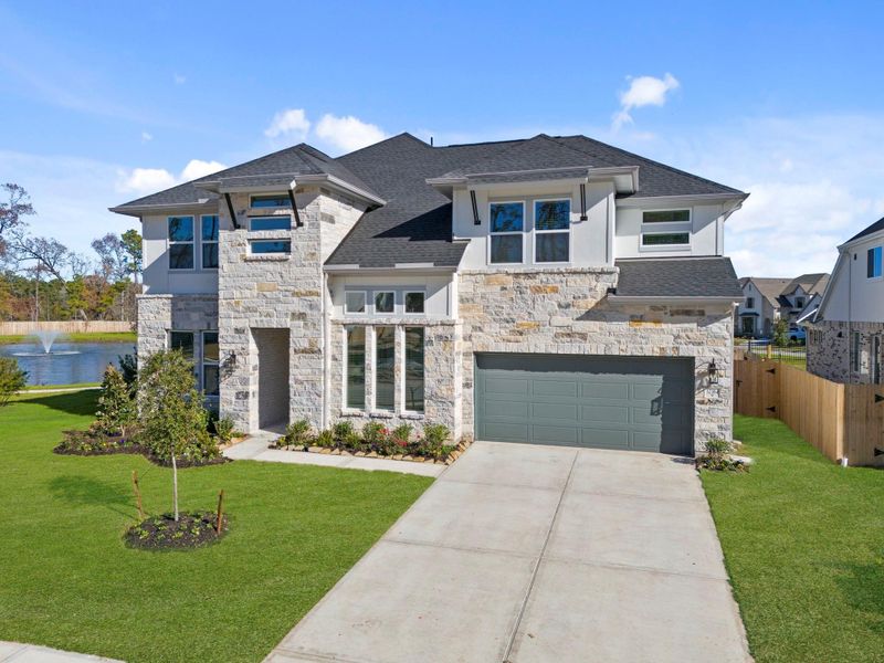 Front exterior of a new home in , Spring, TX, highlighting curb appeal (Image 24).