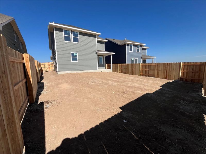 Exterior details and patio area of a home in The Homestead at Lariat, Liberty Hill (Image 2). Exterior details and patio area of a home in The Homestead at Lariat, Liberty Hill (Image 2).