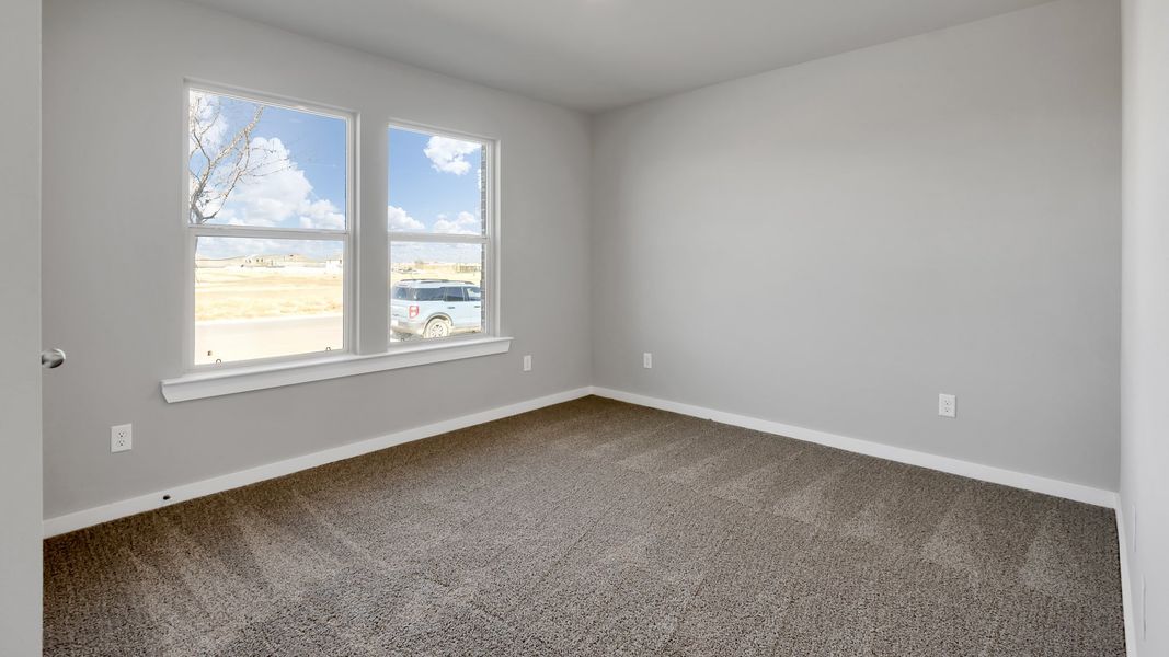 Representative unfurnished interior of a home built from the The Bentworth by D.R. Horton in Viridian, Lubbock (Image 25).