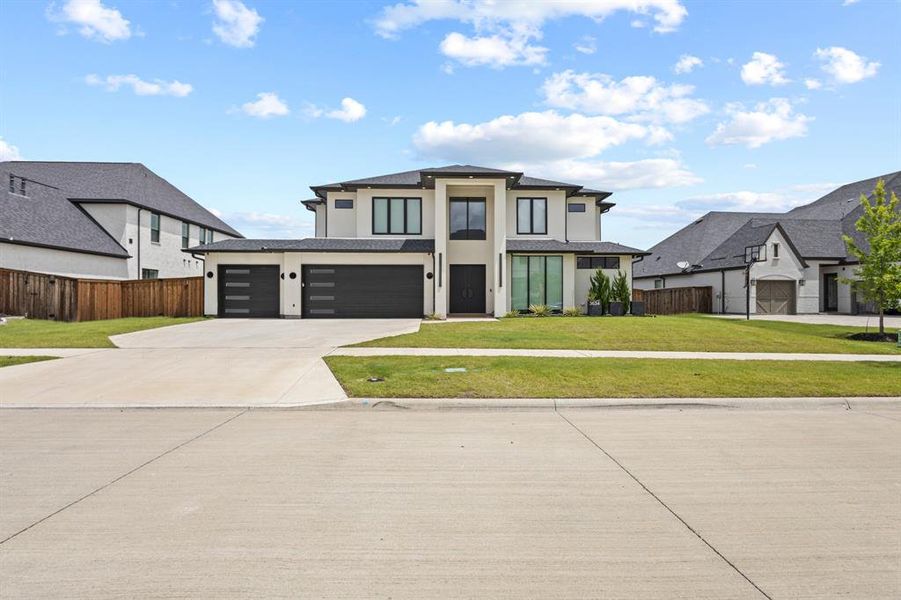 Front exterior of a new home in , Frisco, TX, highlighting curb appeal (Image 24). Front exterior of a new home in , Frisco, TX, highlighting curb appeal (Image 24).