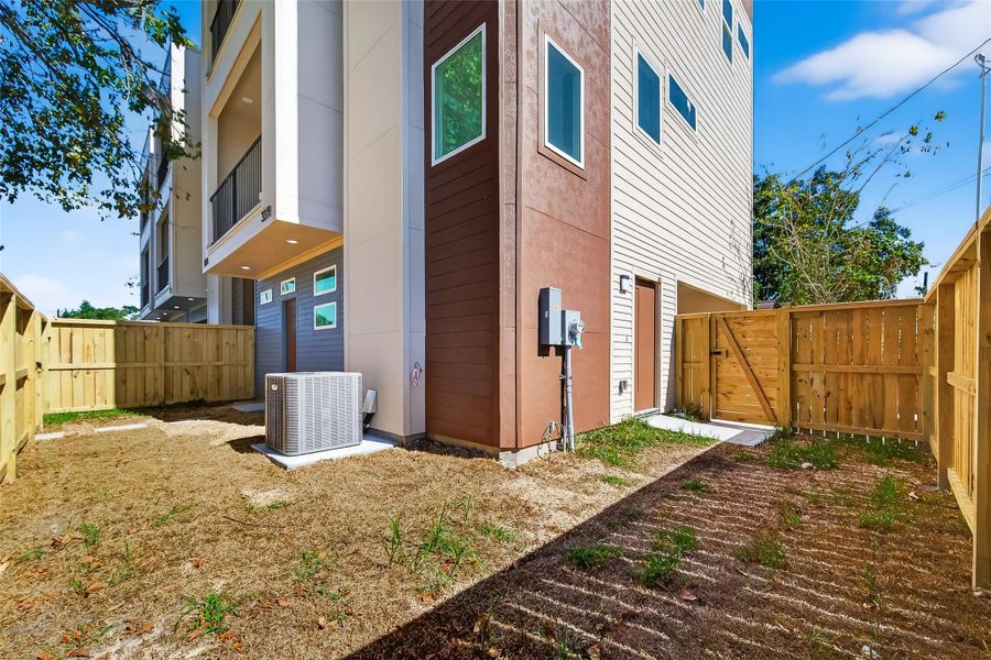 Exterior details and patio area of a home in , Houston (Image 23).