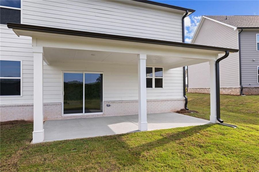 Exterior details and patio area of a home in The Estates at Gainesville Township, Gainesville (Image 20).